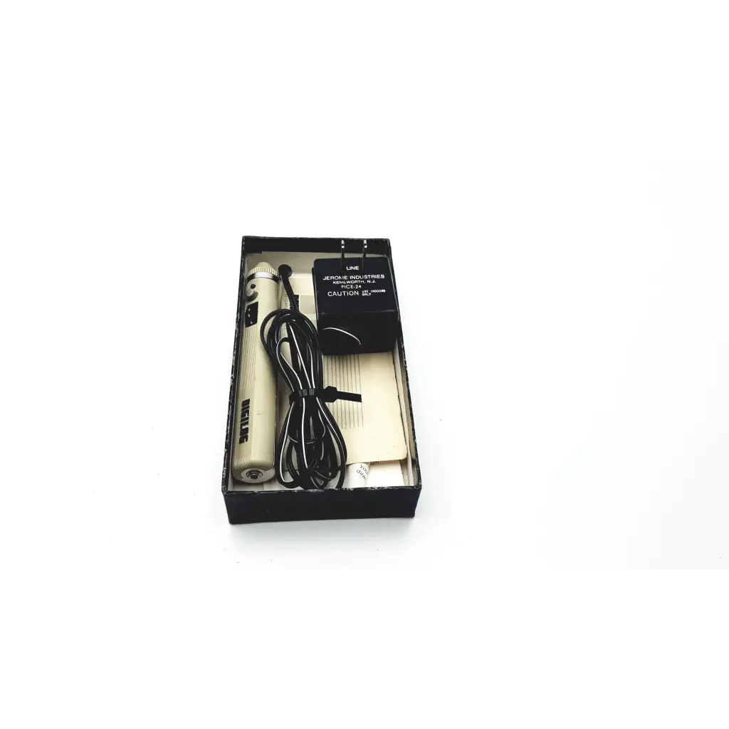 Cream-colored jepson industries model 12 electric hair clipper in original box with power adapter shown with demetron digilog electronic pulp tester