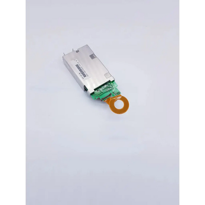 Silver rectangular densei-lambda alpha 600 power module with green circuit board and orange connector for nibp assembly board