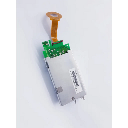 Densei-Lambda Alpha 600 silver power module with green circuit board and orange flexible connector for nibp assembly board