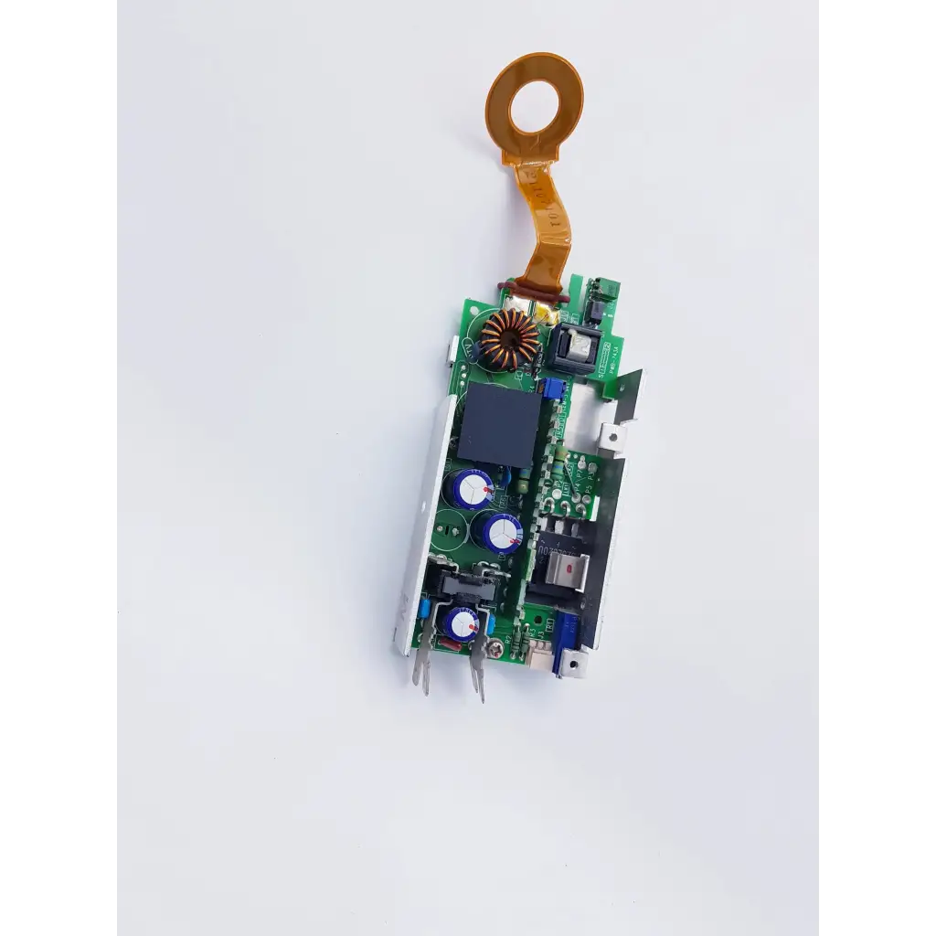 Green circuit board featuring blue capacitors and orange connector in densei-lambda alpha 600 power module for nibp assembly board