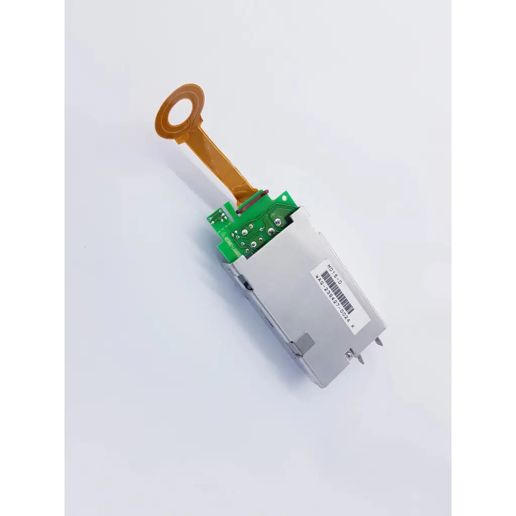 Silver rectangular densei-lambda alpha 600 power module with green circuit board and orange flexible connector for nibp assembly board