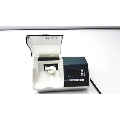 White and black dentsply promix 400 dental amalgamator with ceramic bontex lid for efficient mixing
