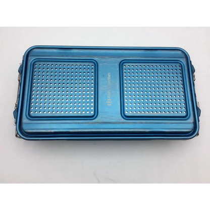 Blue metallic dePuy sterilization container with five-level solid base 28639 and perforated tray sections