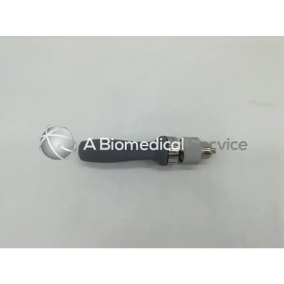 Gray ergonomic depuy mitek ratchet handle with metallic connector and precision tip for medical use