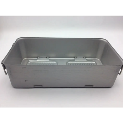 Silver rectangular metal DePuy Synthes sterilization container two level solid with perforated compartments and side handles