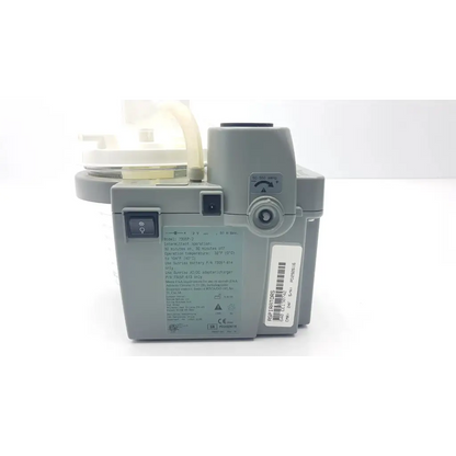 Gray devilbiss suction machine 7305p-d with translucent plastic tubing and labeled specifications for homecare use