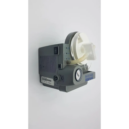 Gray medical suction machine 7305p-d with white plastic facepiece and clear tubing for homecare use