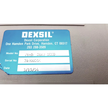 Blue rectangular label with white text showing manufacturer info on the back of a dexsil field star 1000 case