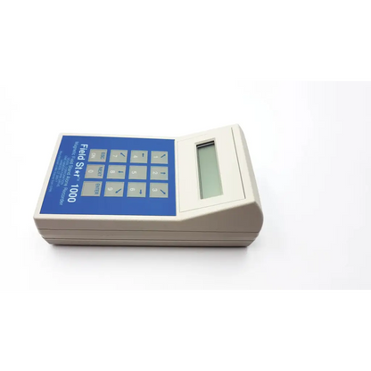 Beige plastic handheld dexsil field star 1000 with blue control panel and digital display with case