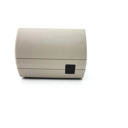 Beige textured plastic thermal printer with black rectangular port on side back view dexsil field star 1000 with case