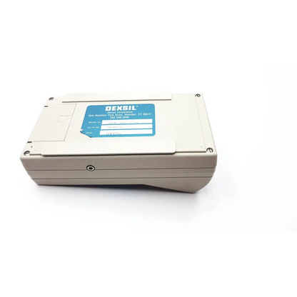 Beige dexsil field star 1000 handheld electronic device with blue label and case for field use