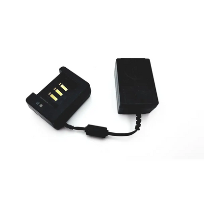 Black rectangular diagnostic ultrasound battery charger ad4-172 with coiled cable connected to matching battery pack
