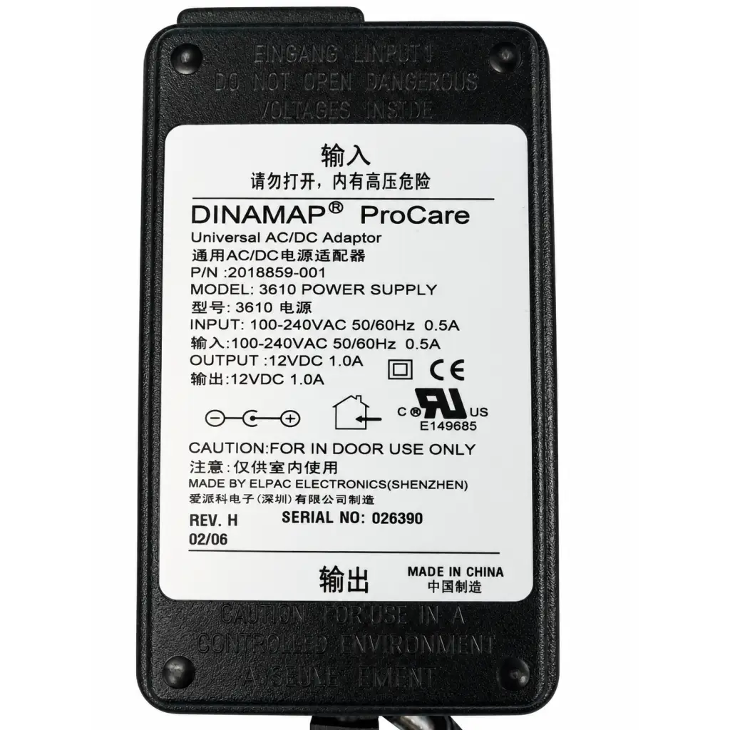 Black dinamap procare 3610 power supply adapter with white label showing input output specs and safety warnings back side