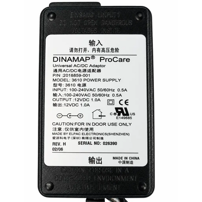Black dinamap procare 3610 power supply adapter with white label showing input output specs and safety warnings back side