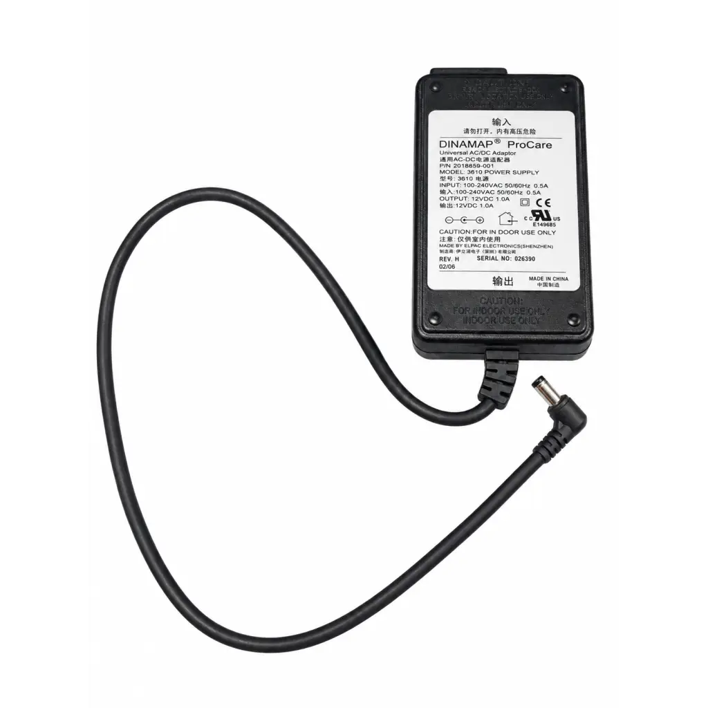 Black dinamap procare 3610 power supply with universal ac/dc adapter, coiled cable, and angled output connector