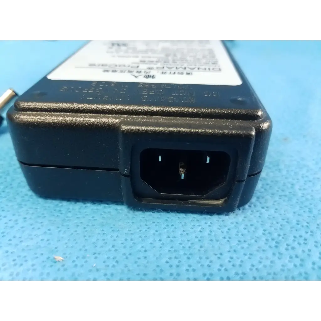 Black plastic rectangular power supply with ac input port for dinamap procare 3610 universal adapter p/n 2018859-001