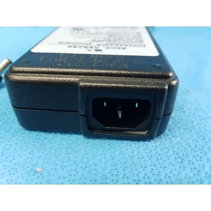 Black plastic rectangular power supply with ac input port for dinamap procare 3610 universal adapter p/n 2018859-001