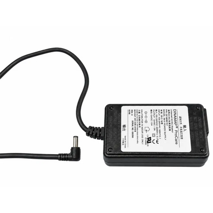 Black plastic power supply adapter with coiled cable and angled connector for dinamap procare 3610 device