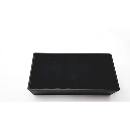 Black rectangular plastic docking station with a glossy finish for universal dual video 4k docking and 100W power