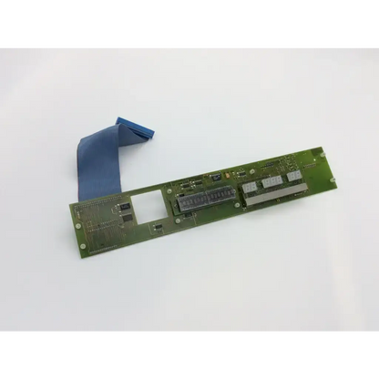 Drager 8202101 1.0 arsm-0116 pcb board green rectangular with integrated components and blue ribbon cable attached