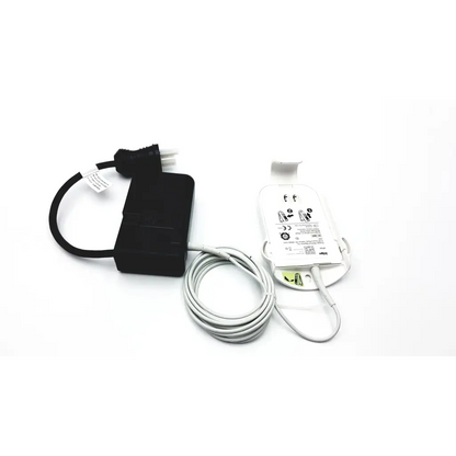 Black power adapter with coiled white charging cable and white wall-mounted charger for drager ms29558 patient telemetry bedside charge meso1004a1918