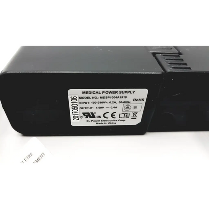 Black rectangular medical power supply unit with white label model mesp1004a1918 for drager ms29558 patient telemetry bedside charge meso1004a1918