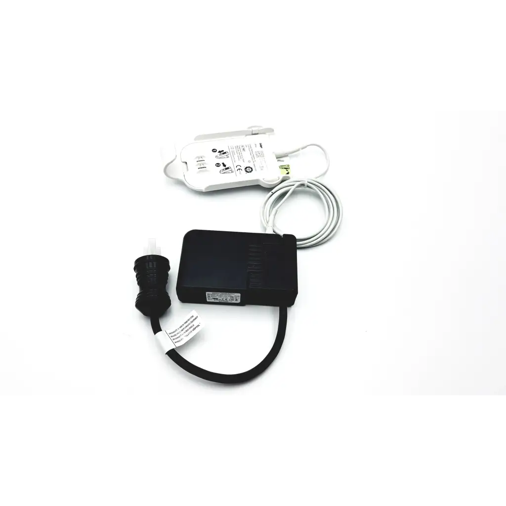 Black rectangular power adapter with coiled cable and black connector for drager ms29558 patient telemetry bedside charge meso1004a1918