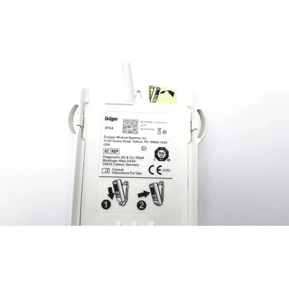 White plastic drager ms29558 patient telemetry device with molded handles and bedside charge meso1004a1918 label