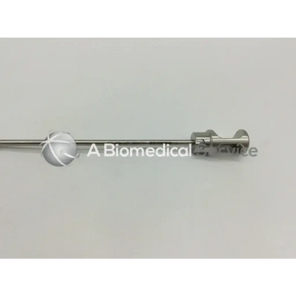 Dyonics 4356 conical tip obturator with a sleek metallic polished stainless steel shaft and spherical end cap