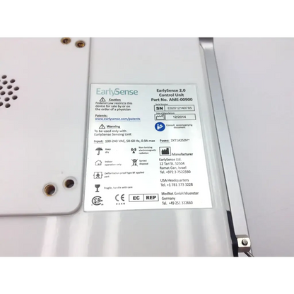 White plastic earlysense 2.0 wireless patient bed monitor control unit showing label with part and serial numbers