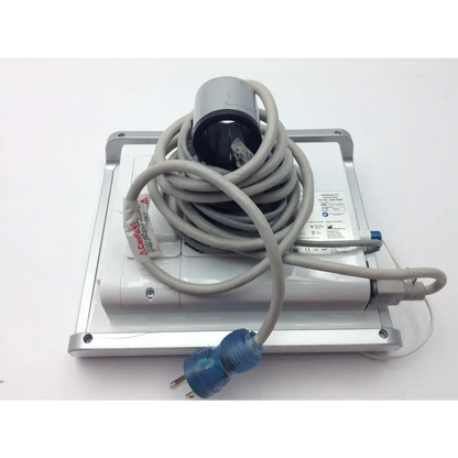 Gray coiled cable with blue plug connected to silver earlysense 2.0 ame-00900 wireless patient bed monitor control unit