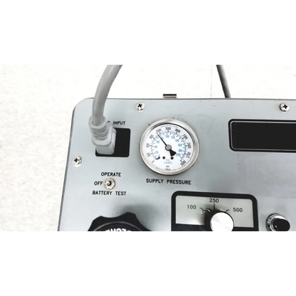 Silver metallic pressure gauge with black needle on gray panel for eaton upc5000 pressure calibration standard
