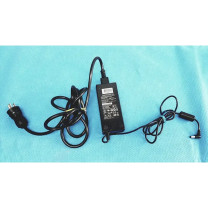 Black plastic edacpower elec em110111m-190 adapter power supply with coiled power cord and detachable connector