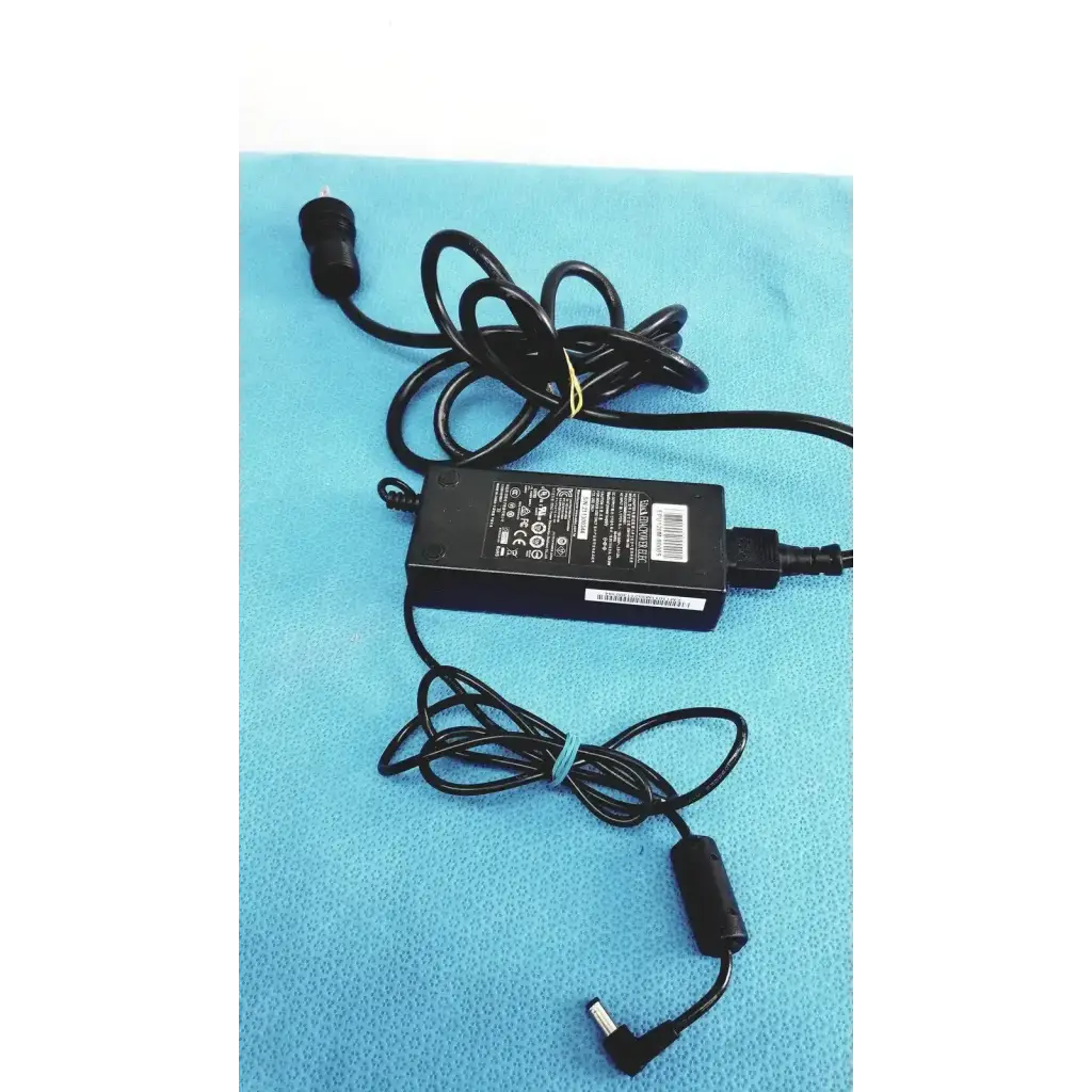 Black plastic edacpower elec em110111m-190 adapter power supply with coiled cord and multiple certification labels