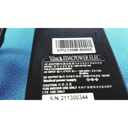 Black edac epu120m-80005 adapter power supply with barcode label and multilingual specifications for em110111m-190 model