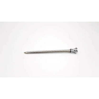 A sleek metallic trocar reusable nail with polished silver finish and rounded head for precision use