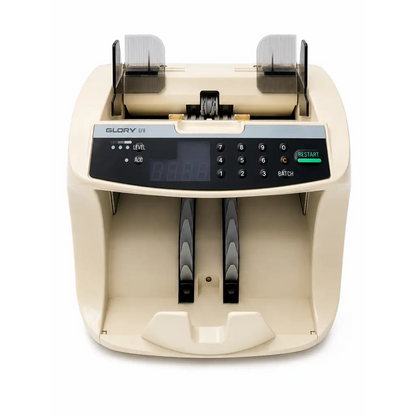 Beige plastic glory g73 currency counter with black control panel and digital display shown with energic 695-box dual battery charger