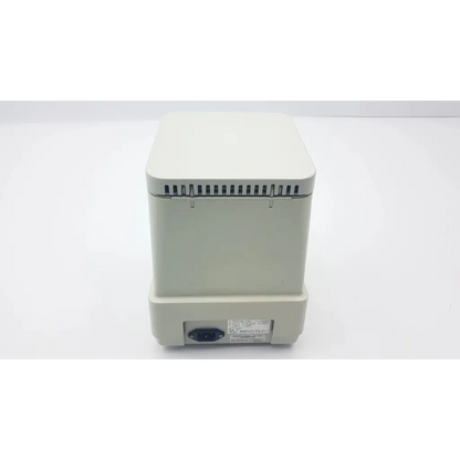 Off-white eppendorf 5415c analog centrifuge with vented top and power input port at the base