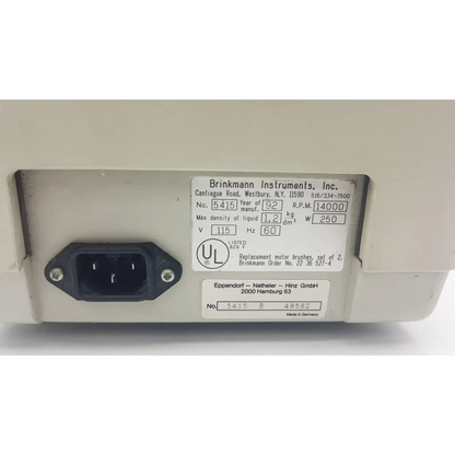 Beige eppendorf 5415c analog centrifuge back view with black power plug and technical specifications label visible