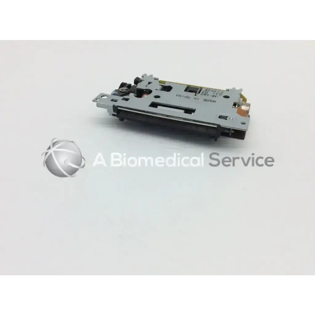 Silver metallic epson m-180 mini printer mechanism with black plastic parts and printer mechanism needle head