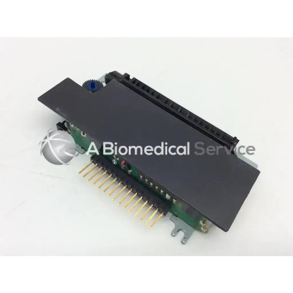 Black rectangular epson m-180 mini printer mechanism with green circuit board and gold-colored printer mechanism needle pins