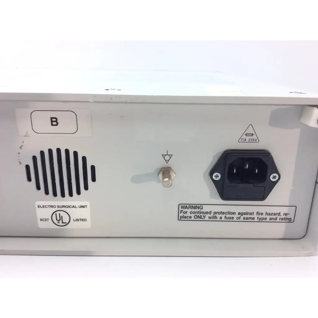 White erbe apc 300 electrosurgical console with black power plug and ventilation slits on the back side