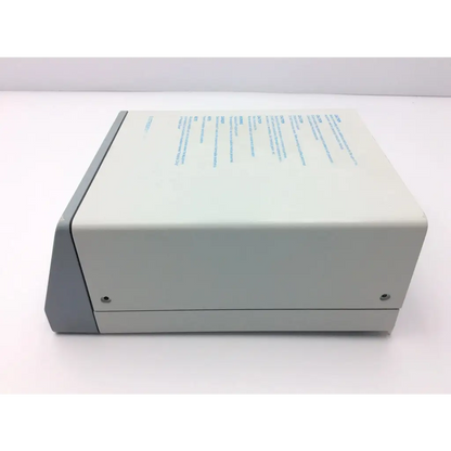 Beige and gray rectangular erbe icc 200 electrosurgical unit with blue printed text on top surface for surgical use