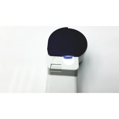 White handheld magnifier eschenbach 7x with black circular lens and blue led light for bbhd3-6 use