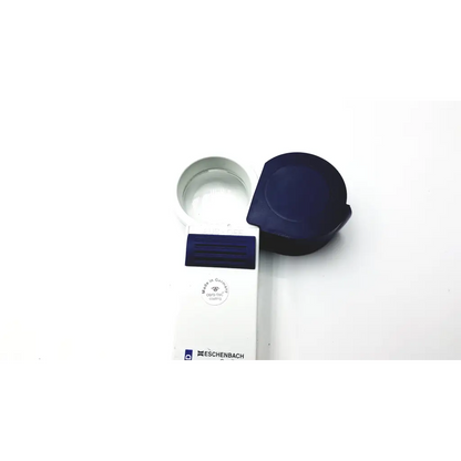 Eschenbach 7x 28 d 60 magnifying glass with white and navy blue plastic handle and protective cap bbhd3-6