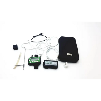 Evergreen telemetry pressure velocity flow monitor in green and black with digital display control buttons and attached cables