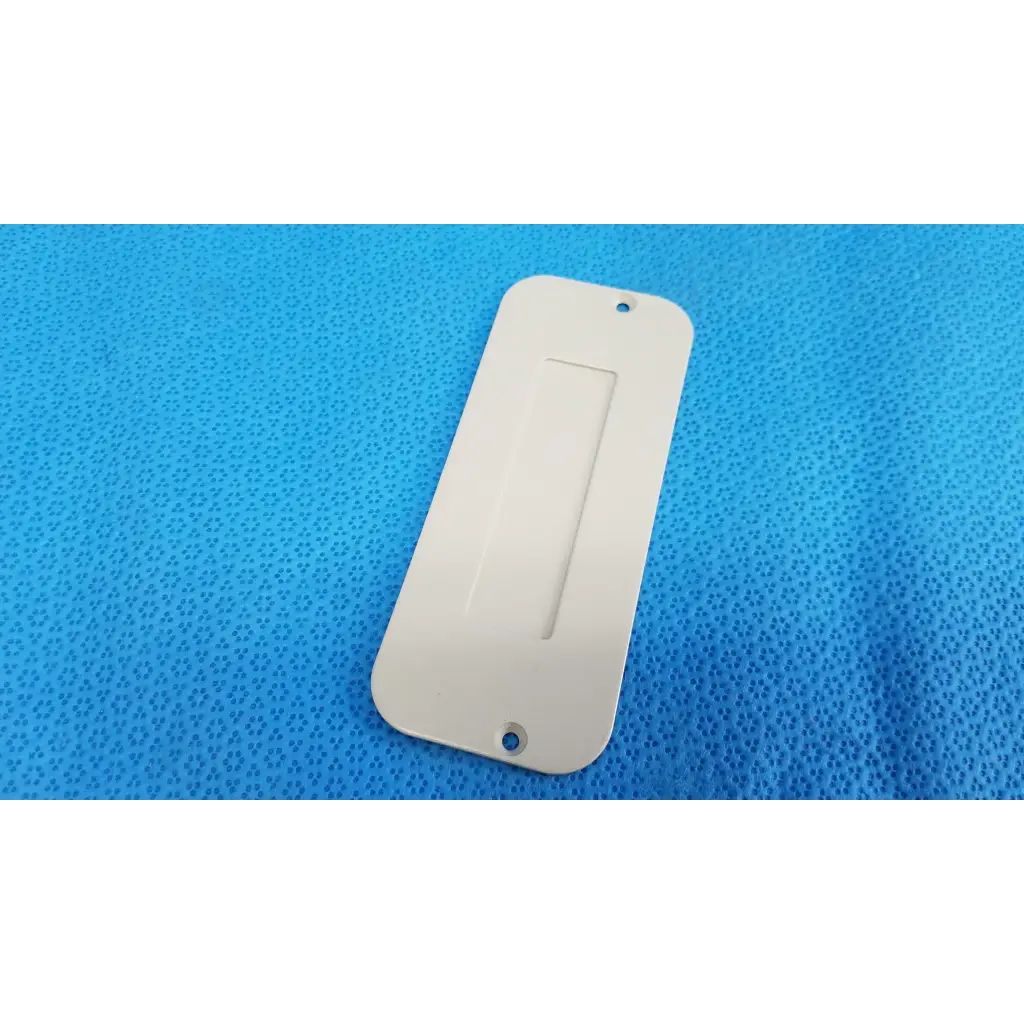 White rectangular plastic external base mechanical interface trim cover plate with central slot for topcon fundus camera