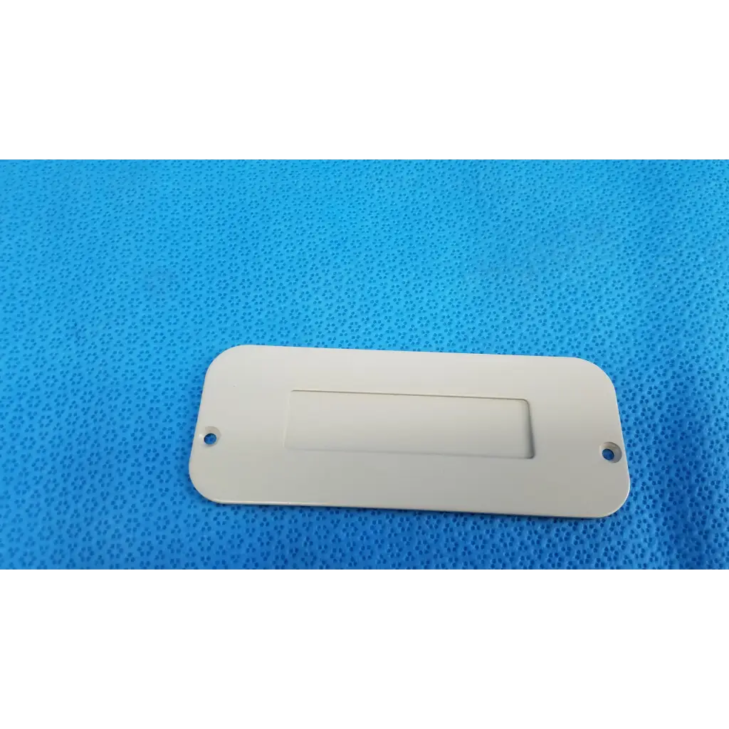 Off-white rectangular metal base mechanical interface trim cover plate with rounded corners for topcon trc-nw8 camera
