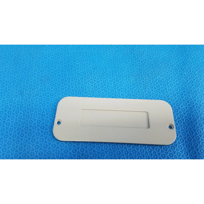 Off-white rectangular metal base mechanical interface trim cover plate with rounded corners for topcon trc-nw8 camera