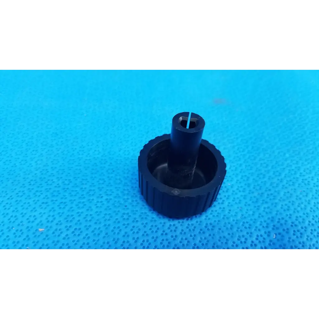 Black plastic external control panel extension dial adjustment knob with textured ribbed base for topcon fundus camera